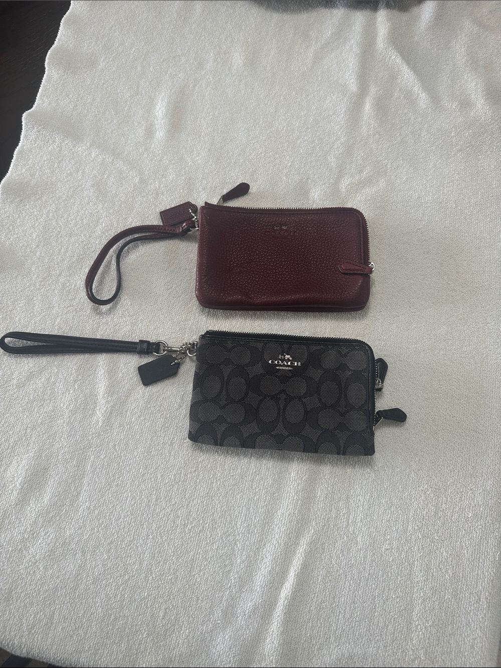 Coach Black Signature Canvas and Burgundy Pebbled Leather Wristlets